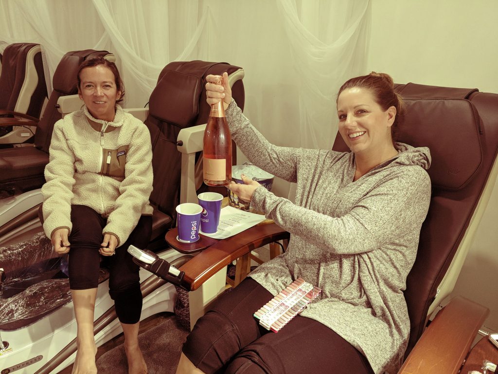 Two friends and a bottle of rose